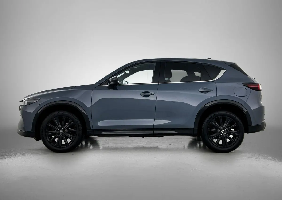 2.0 SkyActiv-G 165 Homura Limited | HEAD-UP | NAVIGATIE | CAMERA | STOEL-STUURWIELVERWARMING | DRAADLOZE TELEFOONLADER