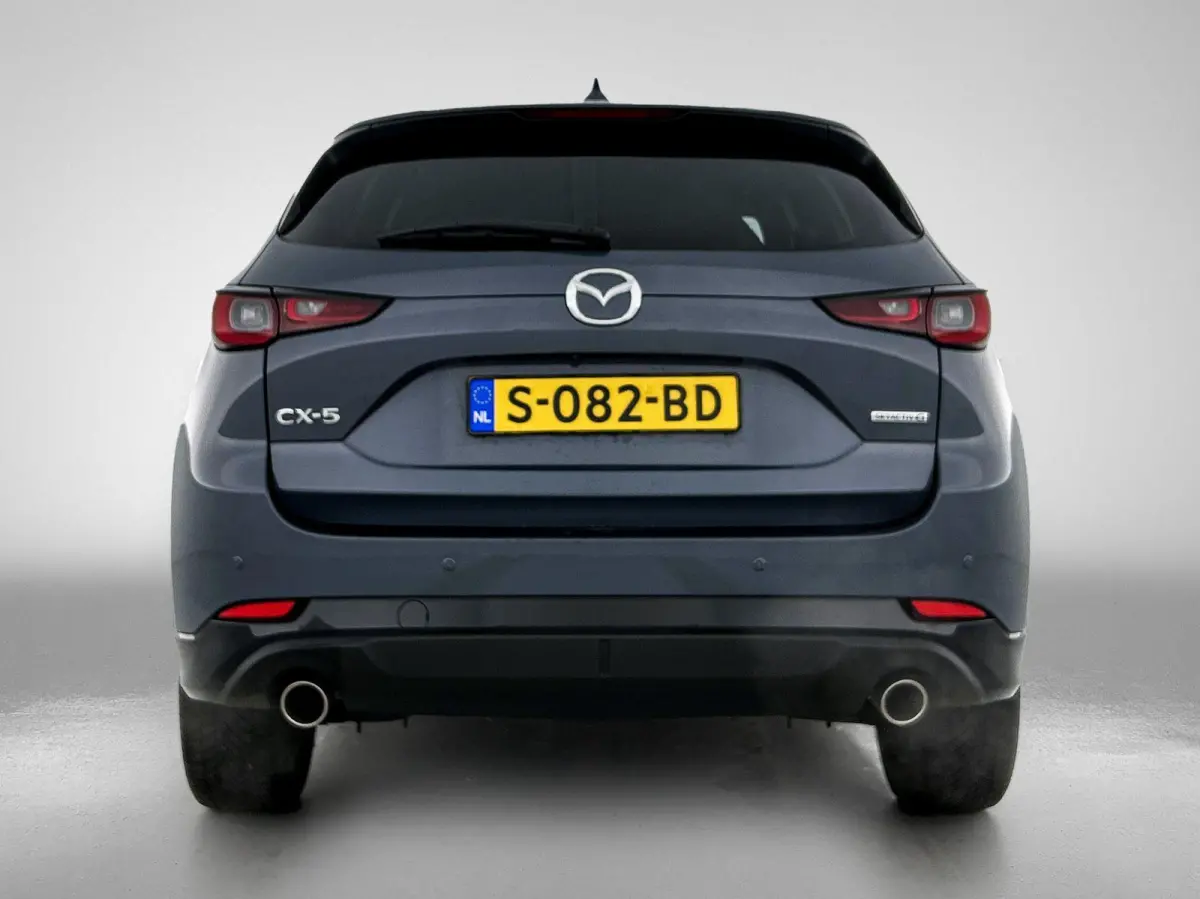 2.0 SkyActiv-G 165 Homura Limited | HEAD-UP | NAVIGATIE | CAMERA | STOEL-STUURWIELVERWARMING | DRAADLOZE TELEFOONLADER