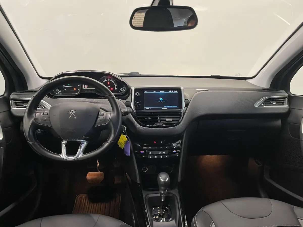 1.2 PureTech Allure Automaat Navigatie Parkeersensoren achter Cruise Control Climate Control Half leder Lichtmetalen velgen Getinte ramen