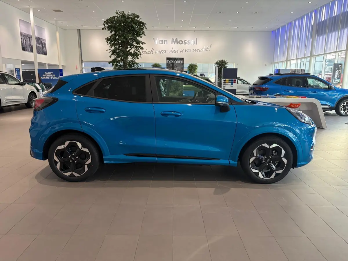 Premium 47 kWh | NIEUW TE BESTELLEN! | B&O AUDIO | STUUR, STOEL EN VOORRUITVERWARMING | 360 GRADEN CAMERA | PARKEERSENSOREN VOOR ÉN ACHTER | ADAPTIEVE CRUISE CONTROL | PANORAMADAK| KEYLESS 