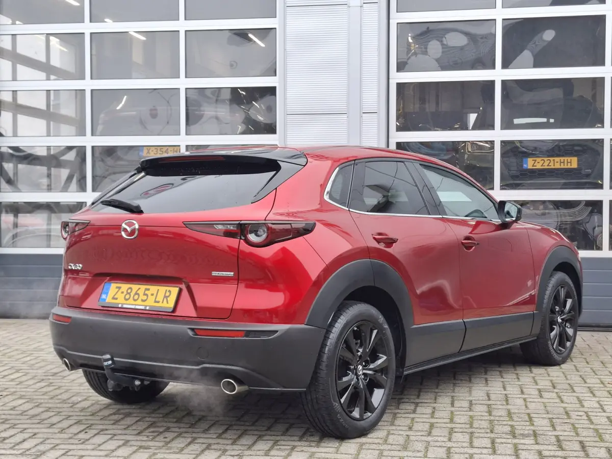 2.0 e-SkyActiv-G M Hybrid Homura | Navigatie/Android/Apple Carplay | Achteruitrij Camera | Voorstoelen Verwarmd | Head-up display | Voorstoelen verwarmd | Cruise Control Adaptief | LM Velgen