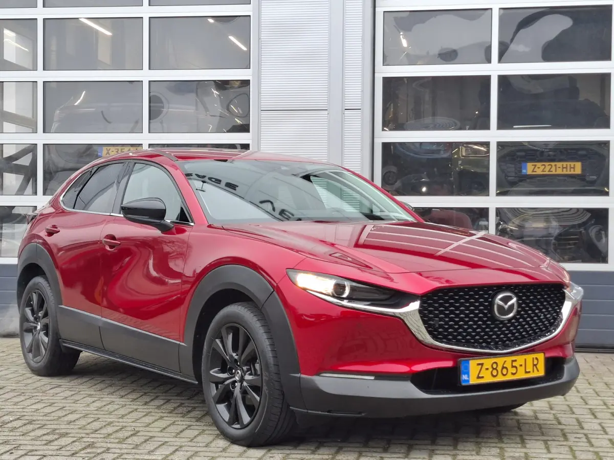2.0 e-SkyActiv-G M Hybrid Homura | Navigatie/Android/Apple Carplay | Achteruitrij Camera | Voorstoelen Verwarmd | Head-up display | Voorstoelen verwarmd | Cruise Control Adaptief | LM Velgen