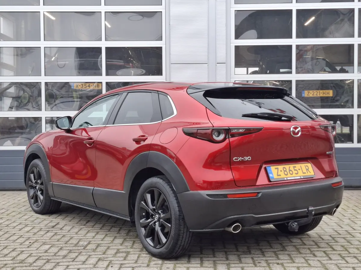 2.0 e-SkyActiv-G M Hybrid Homura | Navigatie/Android/Apple Carplay | Achteruitrij Camera | Voorstoelen Verwarmd | Head-up display | Voorstoelen verwarmd | Cruise Control Adaptief | LM Velgen