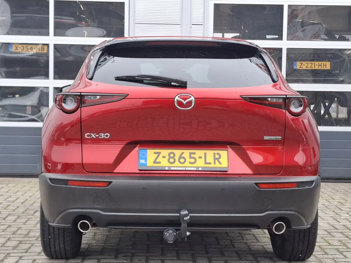 2.0 e-SkyActiv-G M Hybrid Homura | Navigatie/Android/Apple Carplay | Achteruitrij Camera | Voorstoelen Verwarmd | Head-up display | Voorstoelen verwarmd | Cruise Control Adaptief | LM Velgen