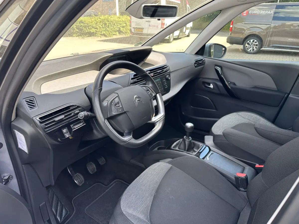 1.2 PureTech Business All-in Prijs Navi/Airco/Cruise/Park sens/Carplay/7Pers Eurorepar