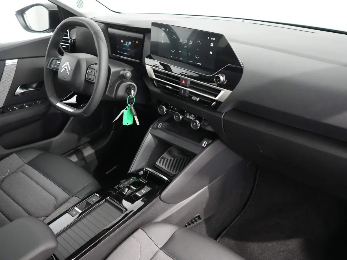 Plus 54 kWh | Achteruitrijcamera | Achteruitrijcamera | Airco (automatisch) | Apple Carplay / Android Auto