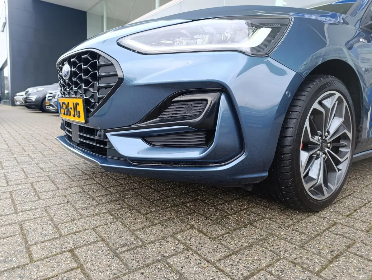 1.0 EcoBoost ST Line X Business | Adaptieve Cruise Control | Trekhaak | Stoel/stuur voorruitverwarming | 18 inch LMV | Dodehoekdetectie | Elek. achterklep