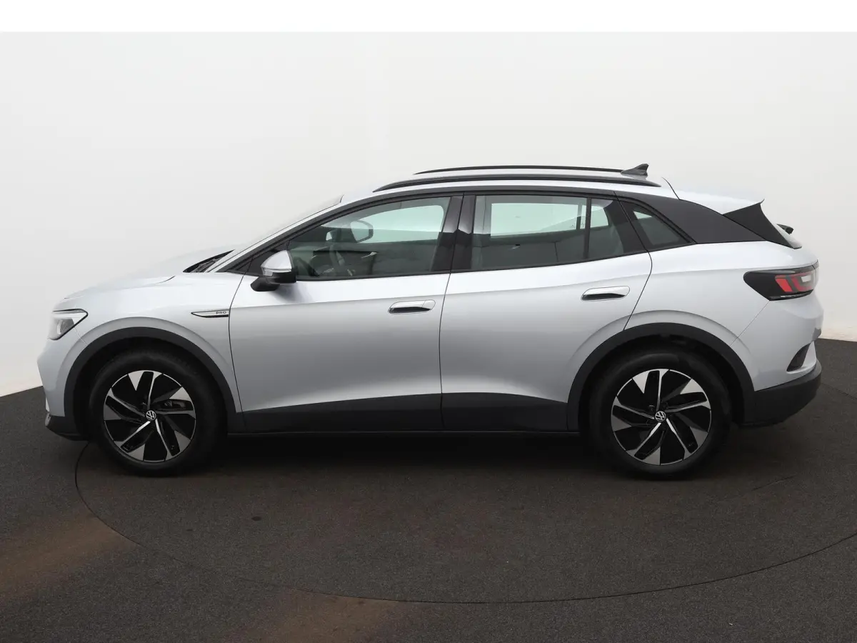 Pro 77 kWh 204 PK Apple Carplay | Stoelverwarming | Stuurwielverwarming | Adaptive Cruise Control | Parkeersensoren | Navigatie | Climate Control | 19'' Lichtmetalen Velgen |