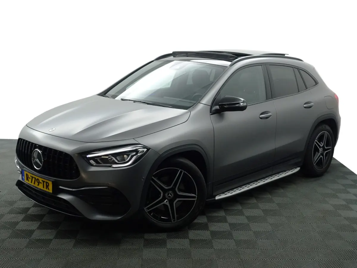 200 AMG Night Edition Aut- Designo Mountaingrijs Magno, Panoramadak, Carbon Treeplanken, Sfeerverlichting