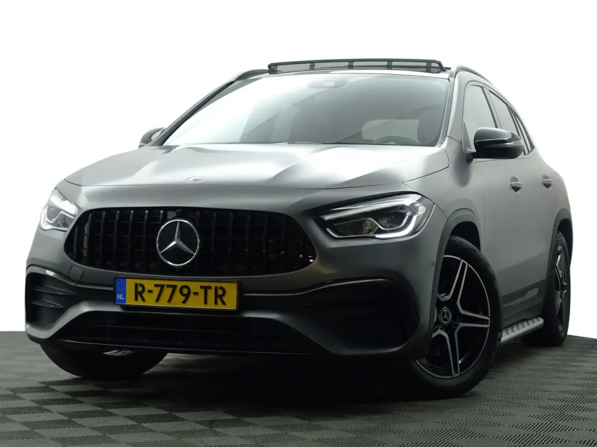 200 AMG Night Edition Aut- Designo Mountaingrijs Magno, Panoramadak, Carbon Treeplanken, Sfeerverlichting