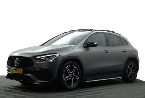 200 AMG Night Edition Aut- Designo Mountaingrijs Magno, Panoramadak, Carbon Treeplanken, Sfeerverlichting