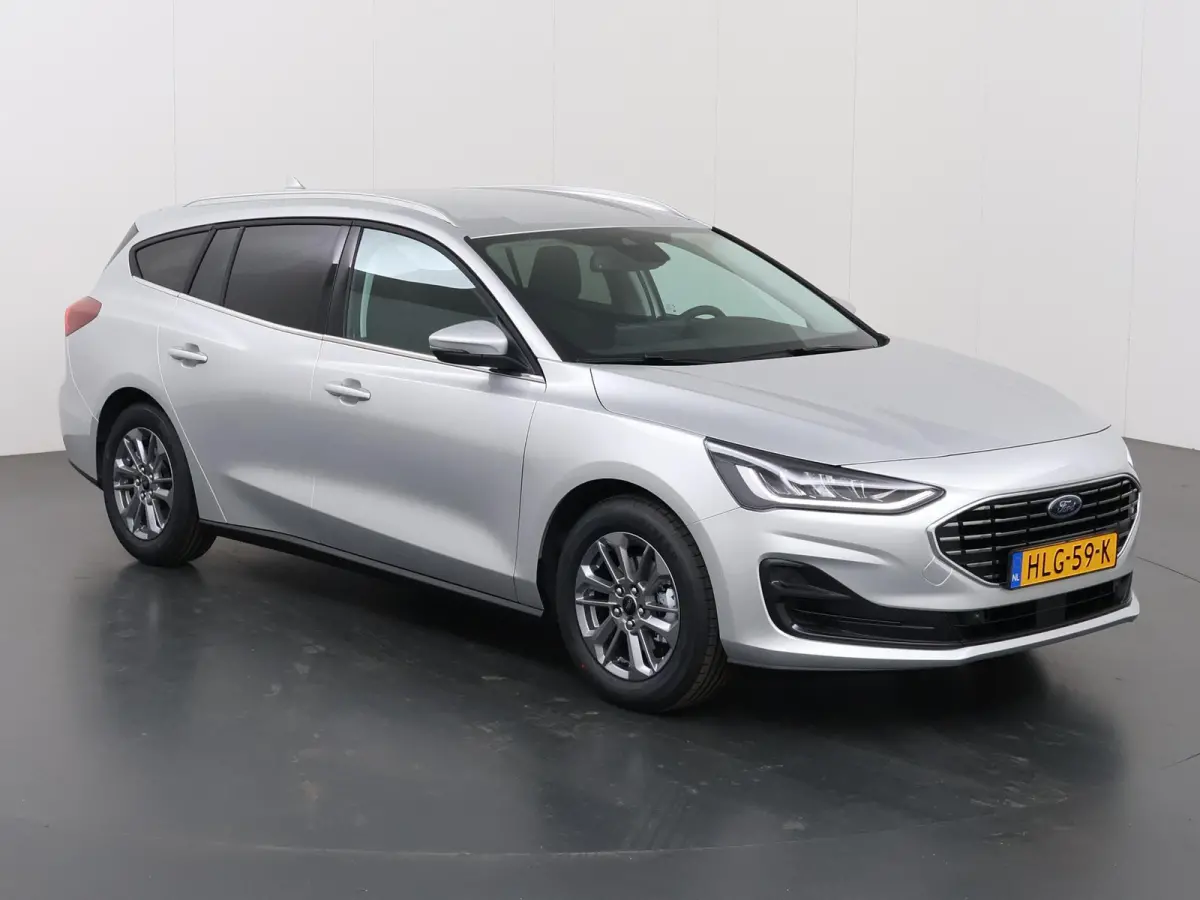 1.0 EcoBoost Hybrid Titanium | Winterpakket | Navigatie | Climate Control | Parkeersensoren | Cruise Control |