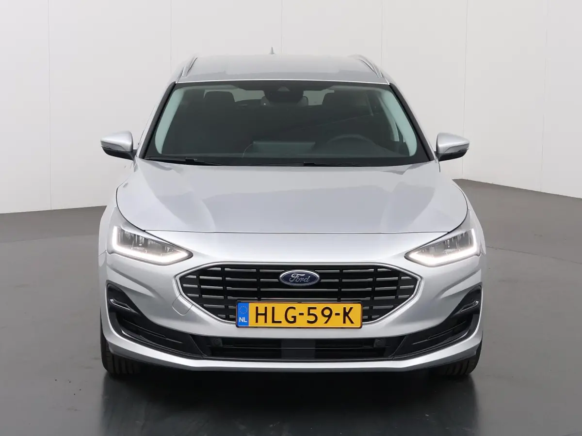 1.0 EcoBoost Hybrid Titanium | Winterpakket | Navigatie | Climate Control | Parkeersensoren | Cruise Control |