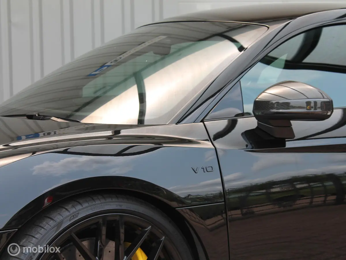- Exclusive V10 PLUS 610pk 5.2 FSI Quattro