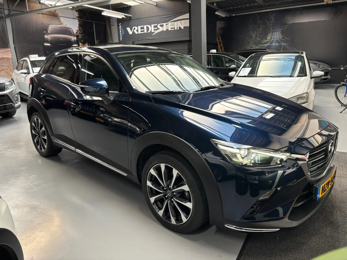 2.0 SkyActiv-G 121 Luxury / Camera / Navigatie