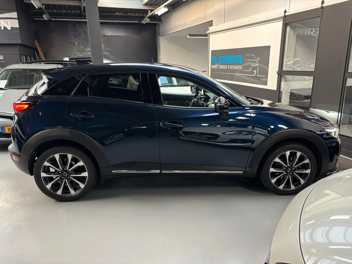 2.0 SkyActiv-G 121 Luxury / Camera / Navigatie