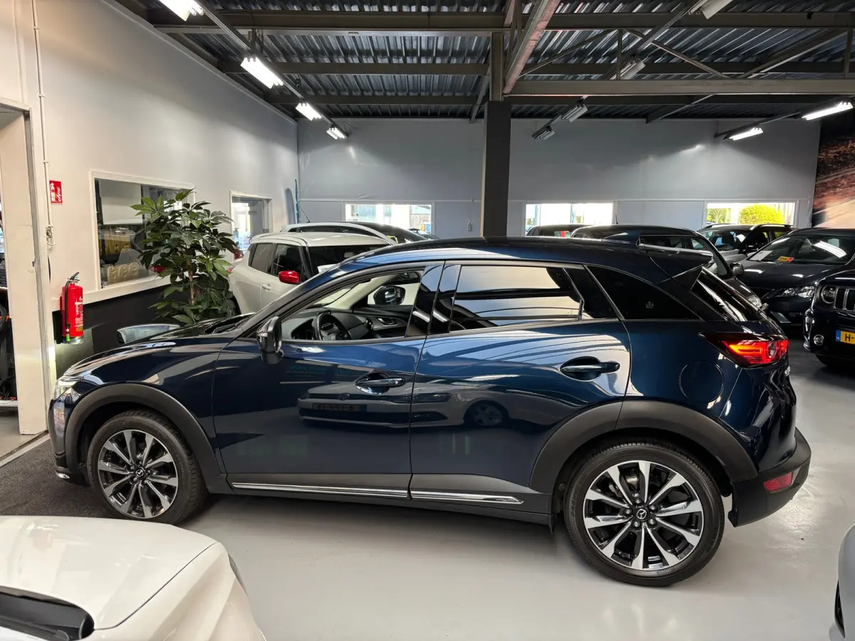 2.0 SkyActiv-G 121 Luxury / Camera / Navigatie