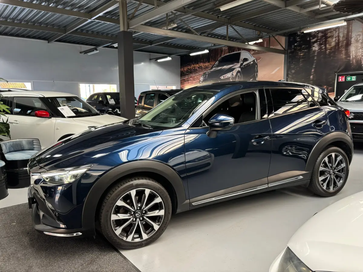 2.0 SkyActiv-G 121 Luxury / Camera / Navigatie