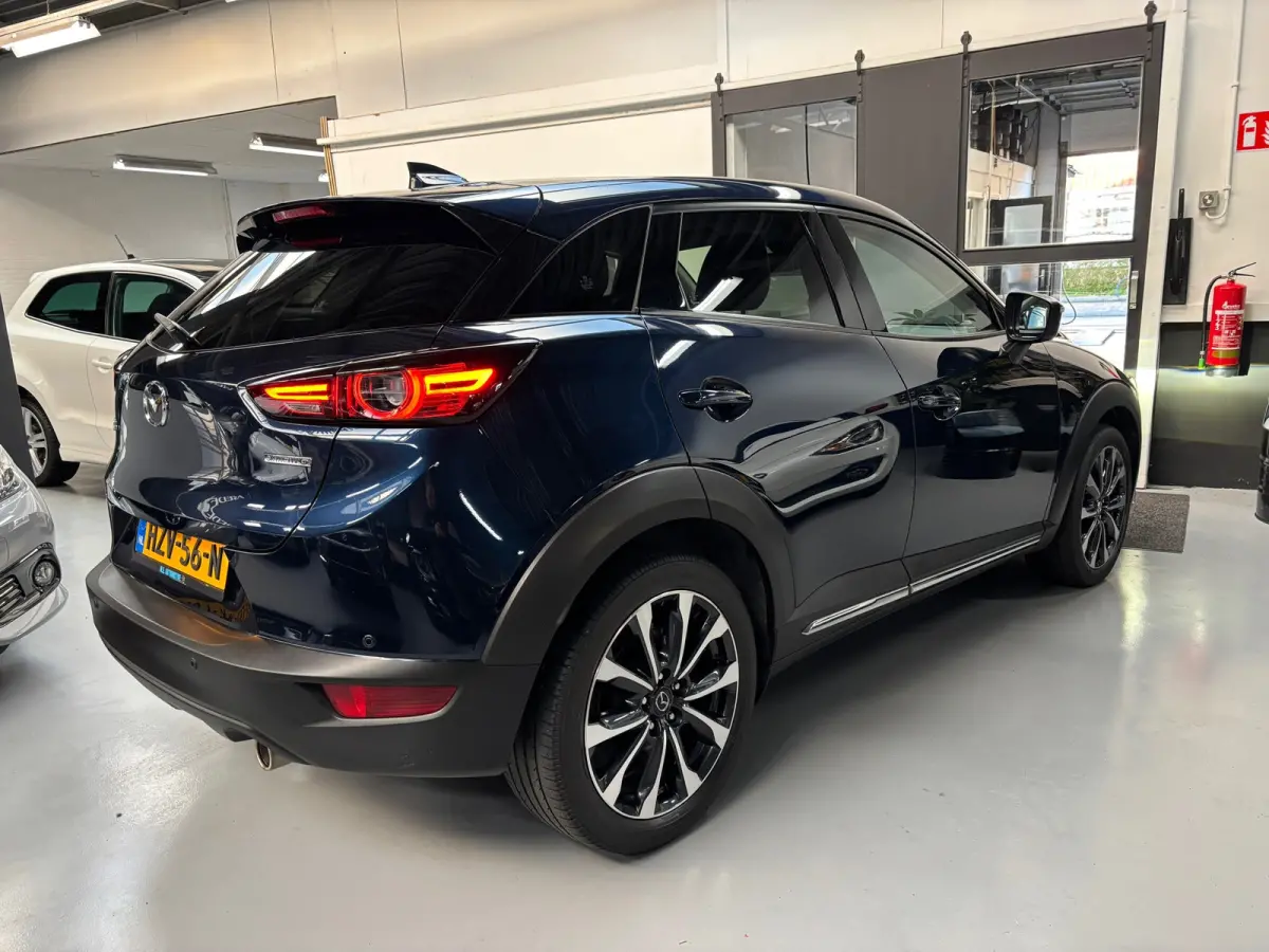 2.0 SkyActiv-G 121 Luxury / Camera / Navigatie