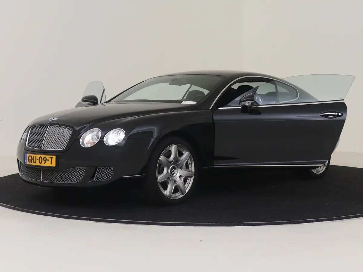 6.0 W12 YOUNGTIMER LEDEREN BEKLEDING / DASHBOARD / HEMEL 20 INCH VELGEN LUCHTVERING MASSAGESTOELEN KEYLESS