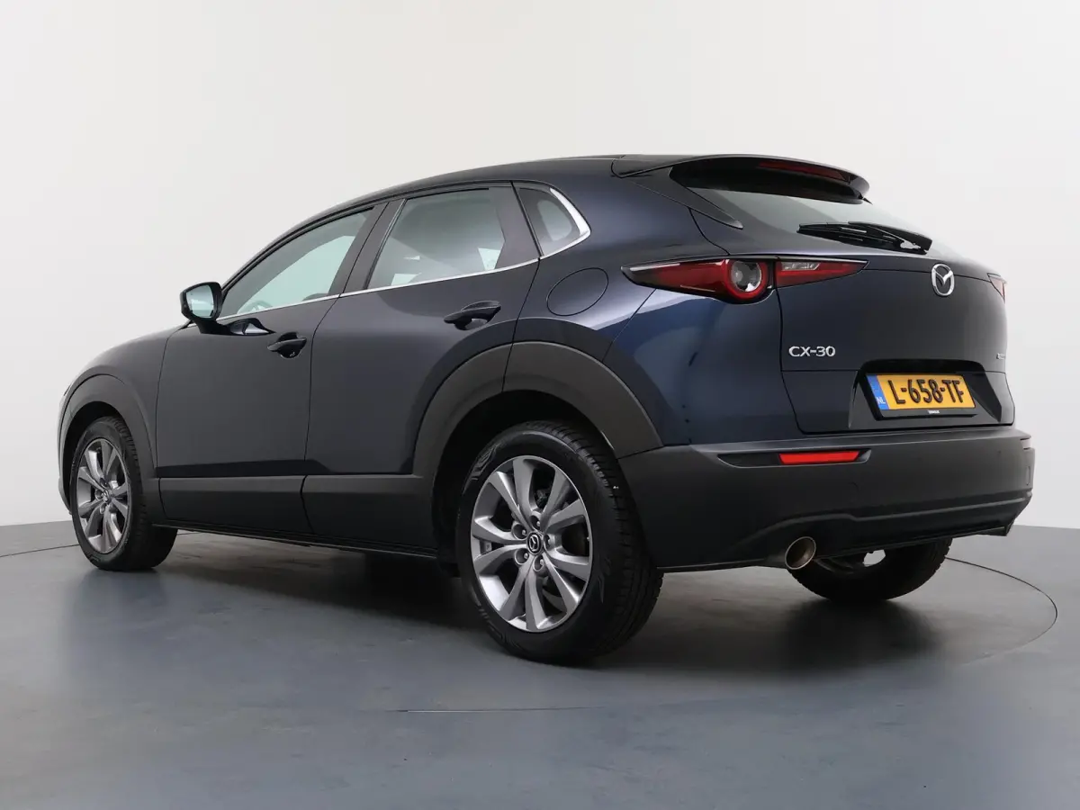 2.0 e-SkyActiv-X M Hybrid Comfort | AUTOMAAT | Adapt. Cruise | Parkeercamera | Head-Up |