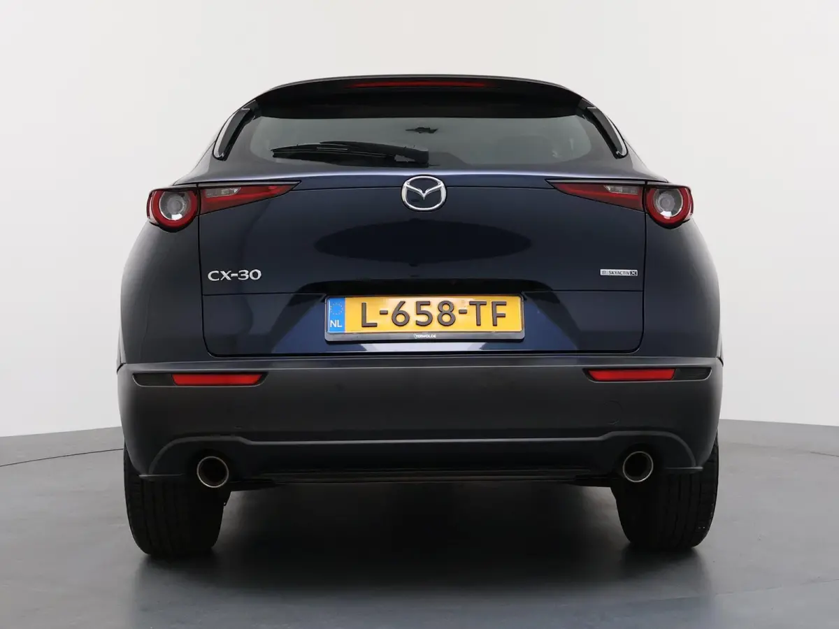 2.0 e-SkyActiv-X M Hybrid Comfort | AUTOMAAT | Adapt. Cruise | Parkeercamera | Head-Up |