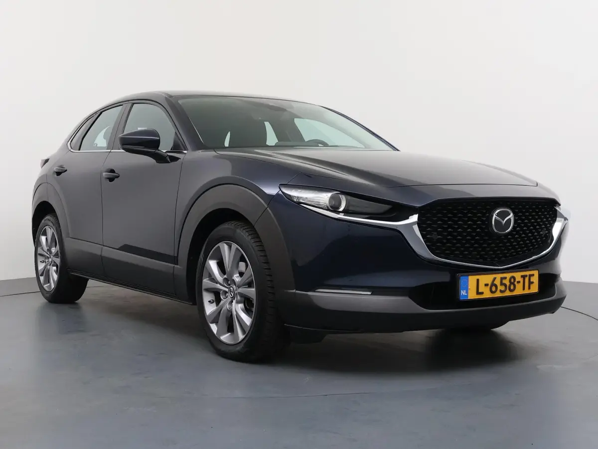 2.0 e-SkyActiv-X M Hybrid Comfort | AUTOMAAT | Adapt. Cruise | Parkeercamera | Head-Up |