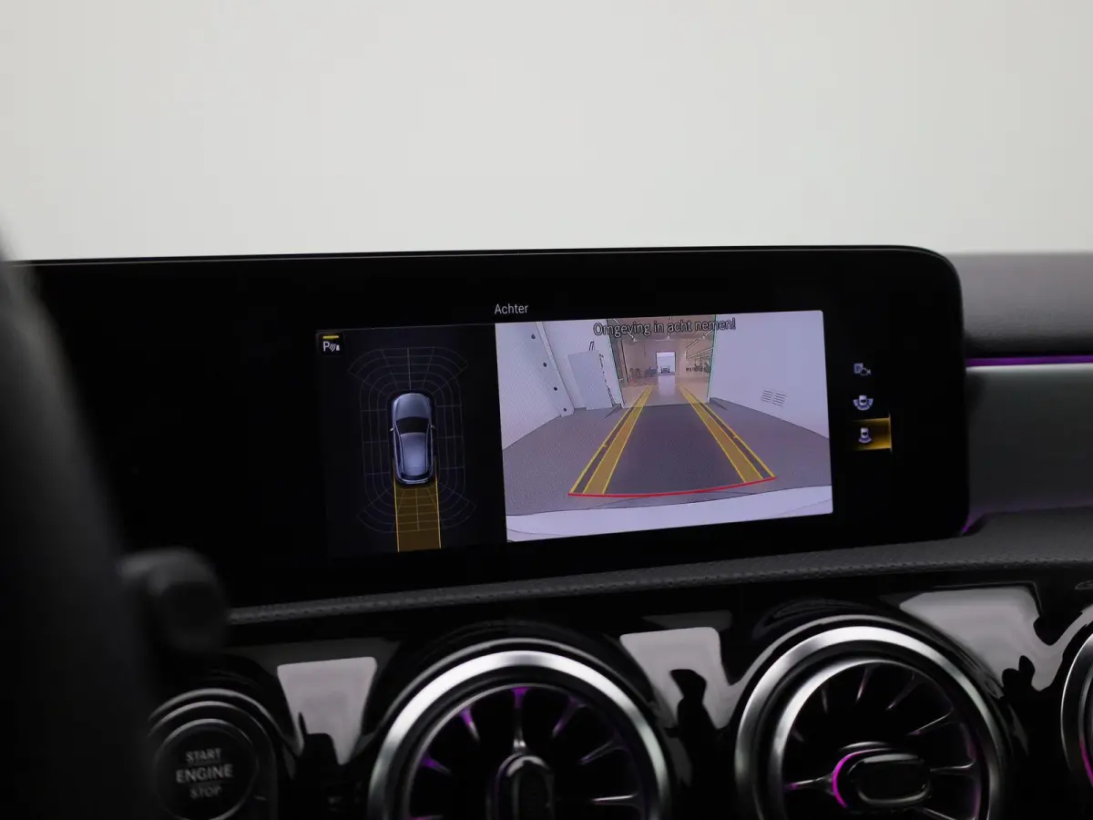 180 Business Solution AMG | Automaat | Navigatie | Sfeerverlichting | Achteruitrijcamera | Stoelverwarming | Wide Screen Virtual Cockpit | Cruise Control | Climate Control | Parkeersensoren 