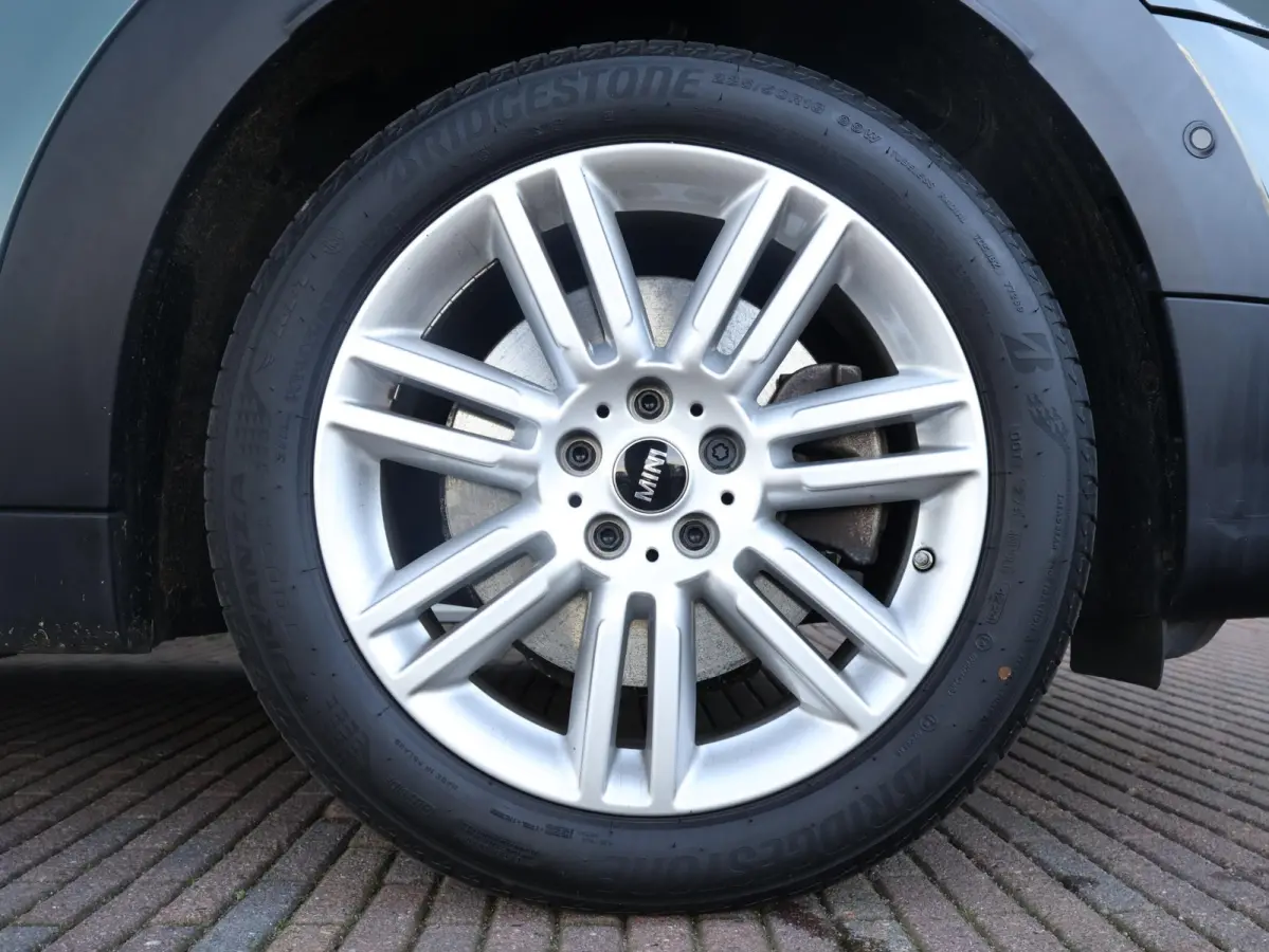 Cooper ALL4 | SoH 85% | Active Cruise Control | Navigatie | Achteruitrijcamera | Comfortstoelen | Elektrische Achterklep