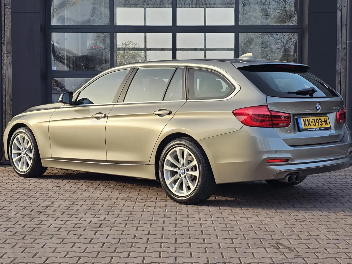 320i Centennial High Executive | Automaat | Navi | Stoelverwarming | LED | Cruise | PDC |