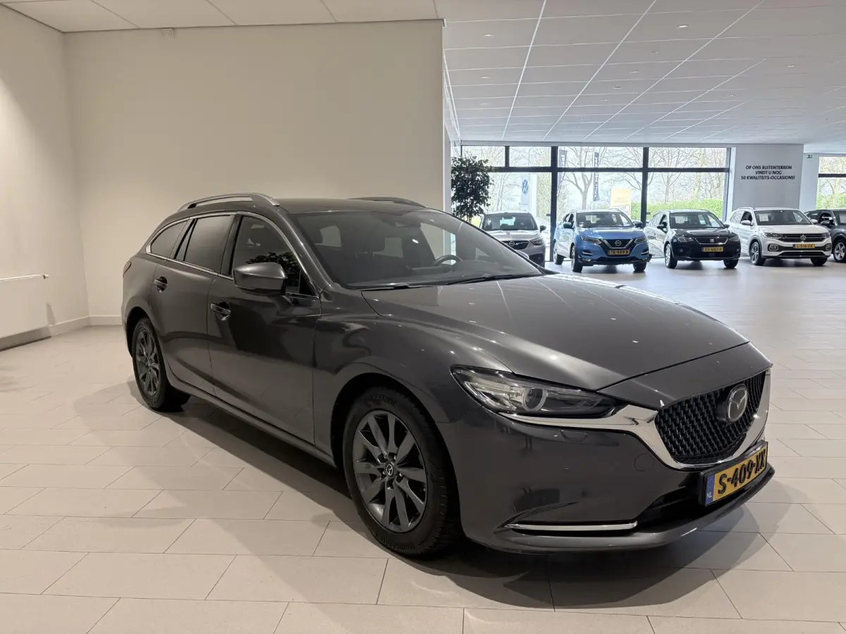 2.5 SkyActiv-G 194 Signature Metaalkleur | Trekhaak | Achterbank verwarmd | Airco | Audio Installatie Premium | Autonomous Emergency Braking | Bluetooth Telefoonverbinding | Cruise Control A