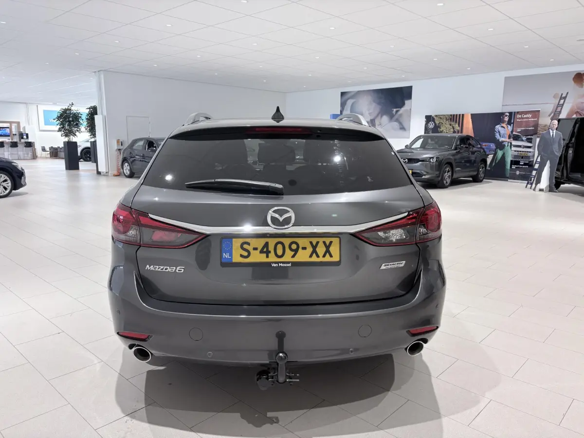 2.5 SkyActiv-G 194 Signature Metaalkleur | Trekhaak | Achterbank verwarmd | Airco | Audio Installatie Premium | Autonomous Emergency Braking | Bluetooth Telefoonverbinding | Cruise Control A