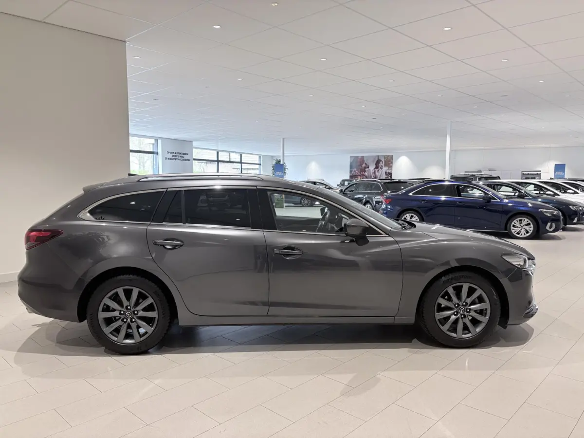 2.5 SkyActiv-G 194 Signature Metaalkleur | Trekhaak | Achterbank verwarmd | Airco | Audio Installatie Premium | Autonomous Emergency Braking | Bluetooth Telefoonverbinding | Cruise Control A