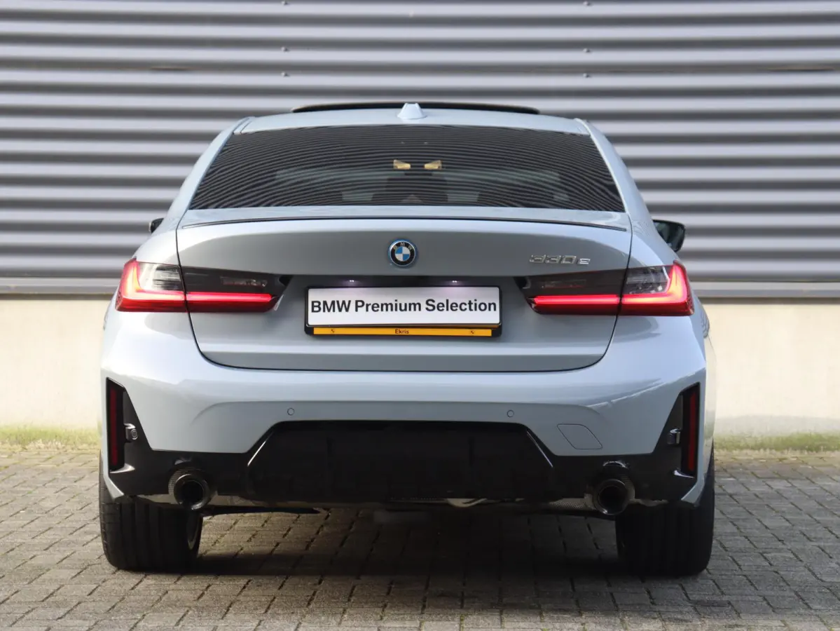 330e | M Sportpakket Pro | Panodak | Head-Up | Adaptive Cruise Control | Trekhaak | Harman Kardon | Elektr. Stoelen | Comfort Access | Driving Assistant | SOH 100% | 19'' LMV