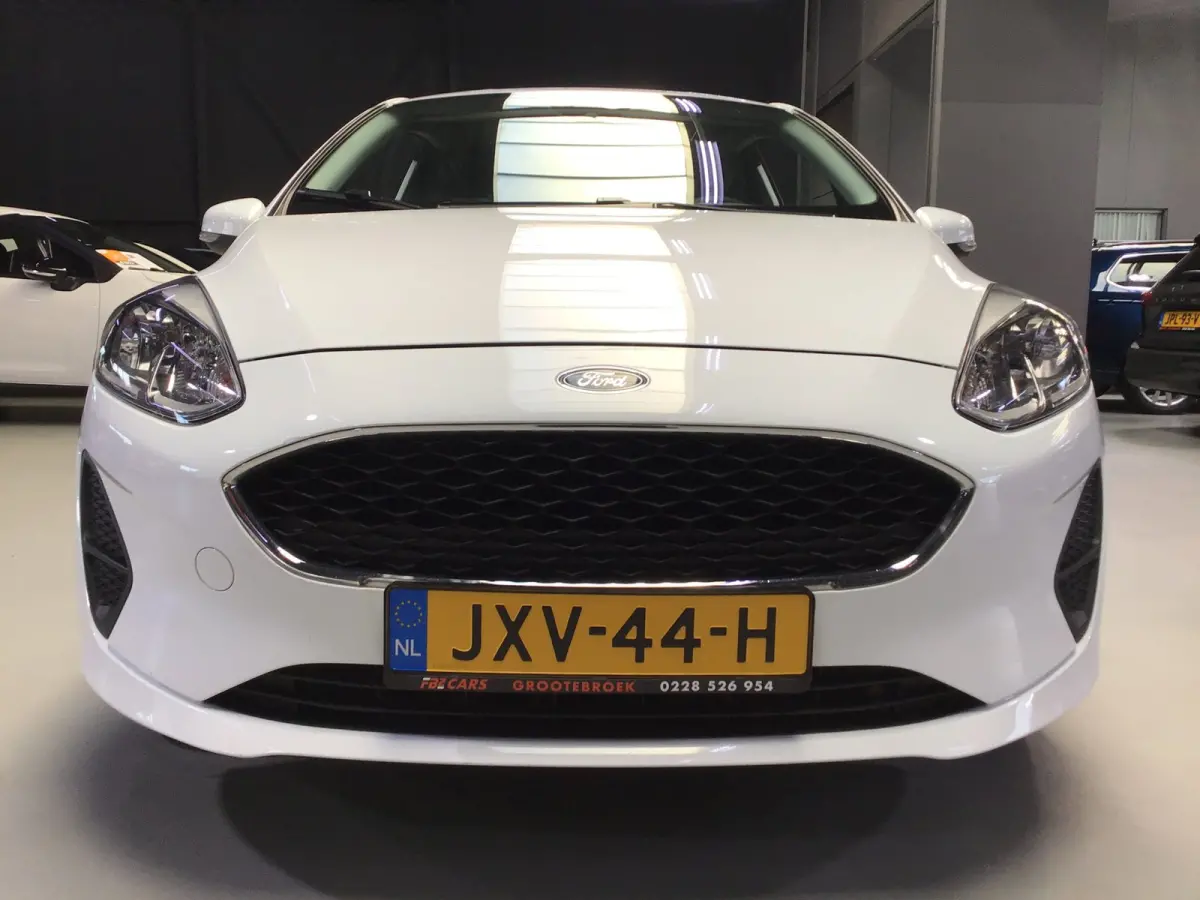 1.0 EcoBoost Titanium I New Apk + Kln Brt I Airco I Cruise I Stoelverw I 100PK I Park.sens I BT I Compl. Onderhouden .