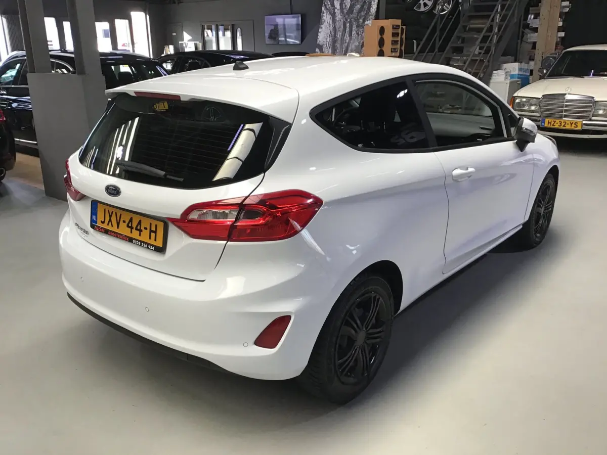 1.0 EcoBoost Titanium I New Apk + Kln Brt I Airco I Cruise I Stoelverw I 100PK I Park.sens I BT I Compl. Onderhouden .