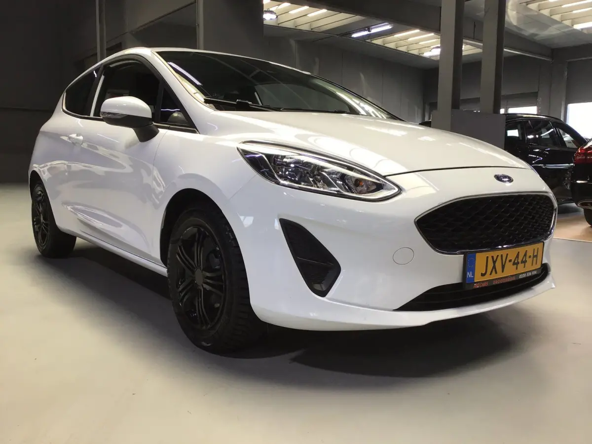 1.0 EcoBoost Titanium I New Apk + Kln Brt I Airco I Cruise I Stoelverw I 100PK I Park.sens I BT I Compl. Onderhouden .