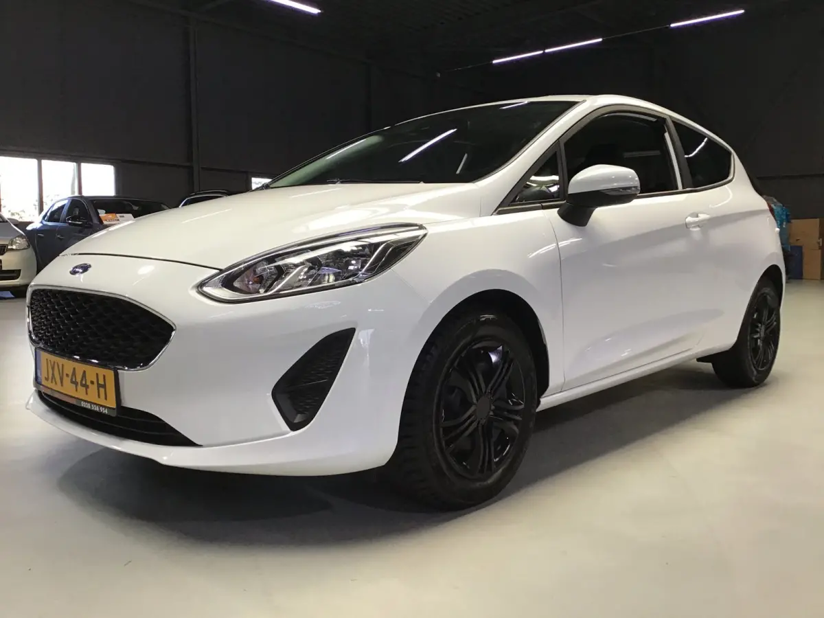 1.0 EcoBoost Titanium I New Apk + Kln Brt I Airco I Cruise I Stoelverw I 100PK I Park.sens I BT I Compl. Onderhouden .