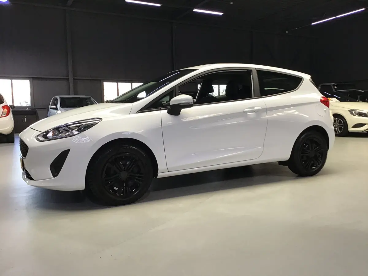 1.0 EcoBoost Titanium I New Apk + Kln Brt I Airco I Cruise I Stoelverw I 100PK I Park.sens I BT I Compl. Onderhouden .