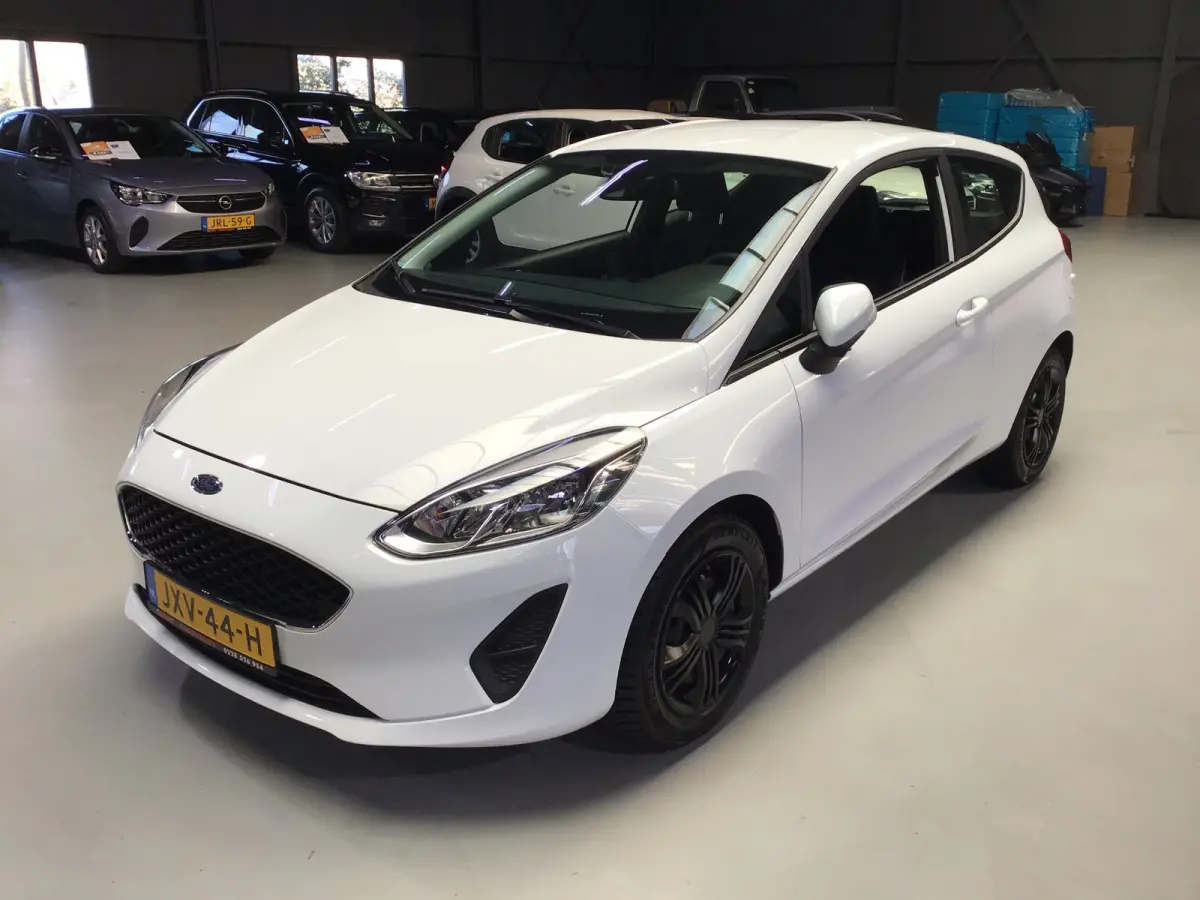 1.0 EcoBoost Titanium I New Apk + Kln Brt I Airco I Cruise I Stoelverw I 100PK I Park.sens I BT I Compl. Onderhouden .