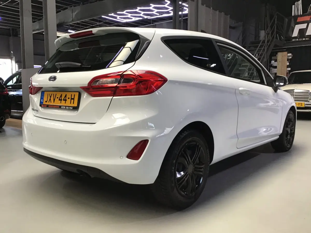 1.0 EcoBoost Titanium I New Apk + Kln Brt I Airco I Cruise I Stoelverw I 100PK I Park.sens I BT I Compl. Onderhouden .