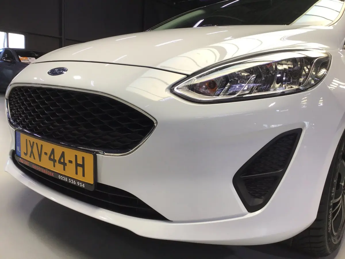 1.0 EcoBoost Titanium I New Apk + Kln Brt I Airco I Cruise I Stoelverw I 100PK I Park.sens I BT I Compl. Onderhouden .