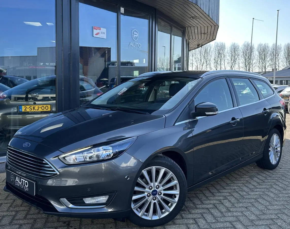 1.0 Titanium 125PK | Zeer Nette Staat | 2e Eigenaar | NL AUTO | Nieuwe D-riem 2026 | Grote Beurt 2026 | Parkeersensoren Voor en Achter | Navigatie | Climate Control | Cruise Control | NAP |