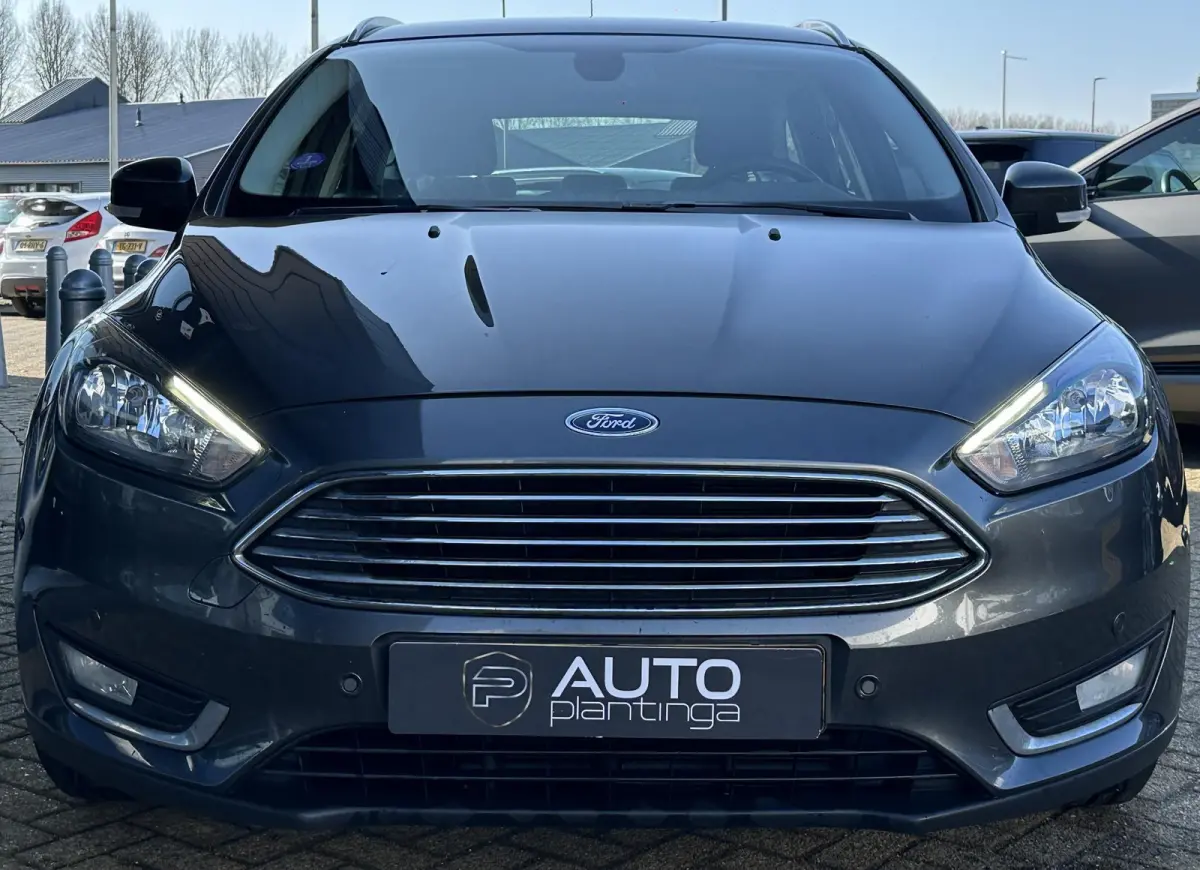 1.0 Titanium 125PK | Zeer Nette Staat | 2e Eigenaar | NL AUTO | Nieuwe D-riem 2026 | Grote Beurt 2026 | Parkeersensoren Voor en Achter | Navigatie | Climate Control | Cruise Control | NAP |