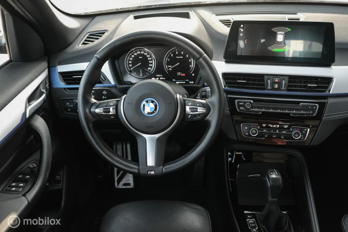 xDrive25e High Executive | M-Sport | LED | HUD | Trekhaak | PHEV | Miniral Grau | Stoelverw.