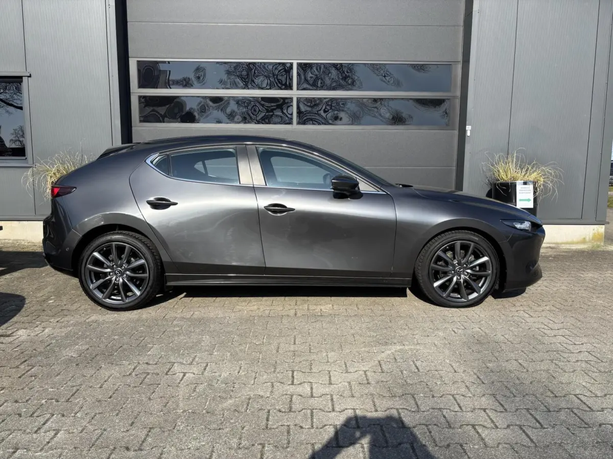2.0 e-SkyActiv-G M Hybrid 122 Luxury | AppleCarPlay/ AndroidAuto | Stuurwielverwarming | Stoelverwarming | Lederen bekleding!!