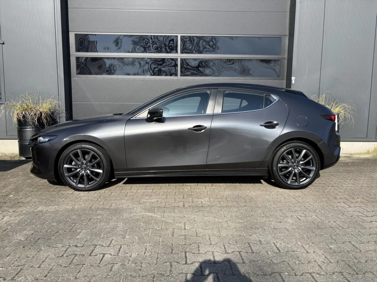 2.0 e-SkyActiv-G M Hybrid 122 Luxury | AppleCarPlay/ AndroidAuto | Stuurwielverwarming | Stoelverwarming | Lederen bekleding!!