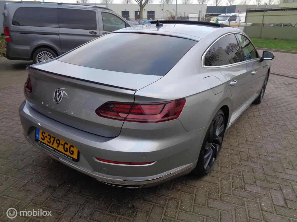 2.0 TSI Business R-Line/ DSG-7/Pano/DCC/Stoeverw/ 20'' Lm velgen/FULL LED/Afn trekhaak/Camera/Airco/nieuwstaat