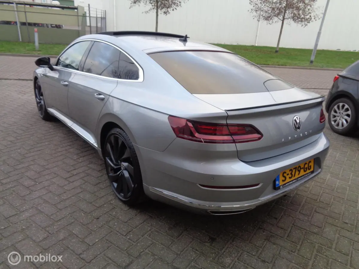 2.0 TSI Business R-Line/ DSG-7/Pano/DCC/Stoeverw/ 20'' Lm velgen/FULL LED/Afn trekhaak/Camera/Airco/nieuwstaat