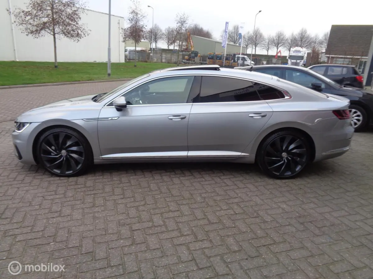 2.0 TSI Business R-Line/ DSG-7/Pano/DCC/Stoeverw/ 20'' Lm velgen/FULL LED/Afn trekhaak/Camera/Airco/nieuwstaat